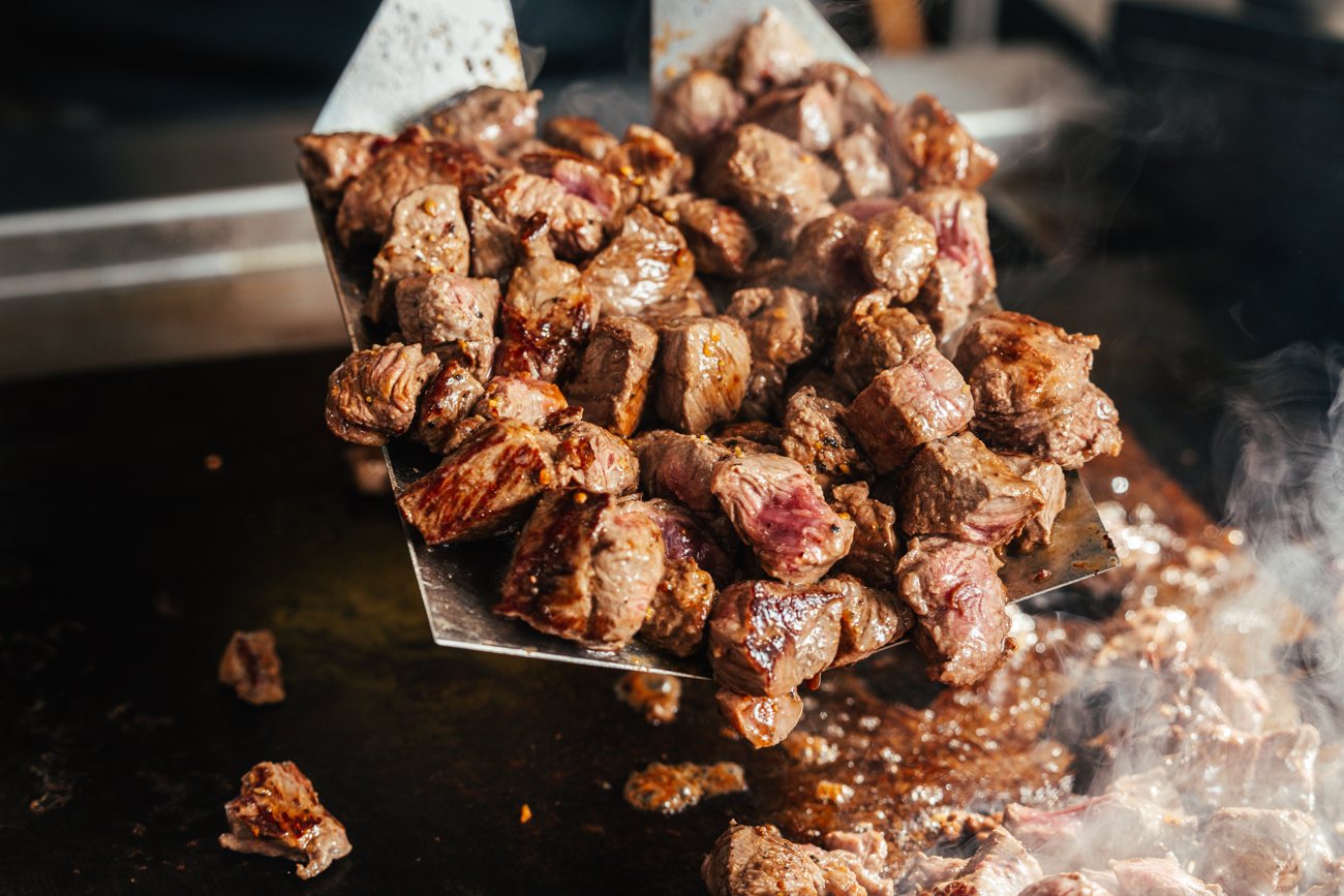 Grilled beef cubes seared over high heat